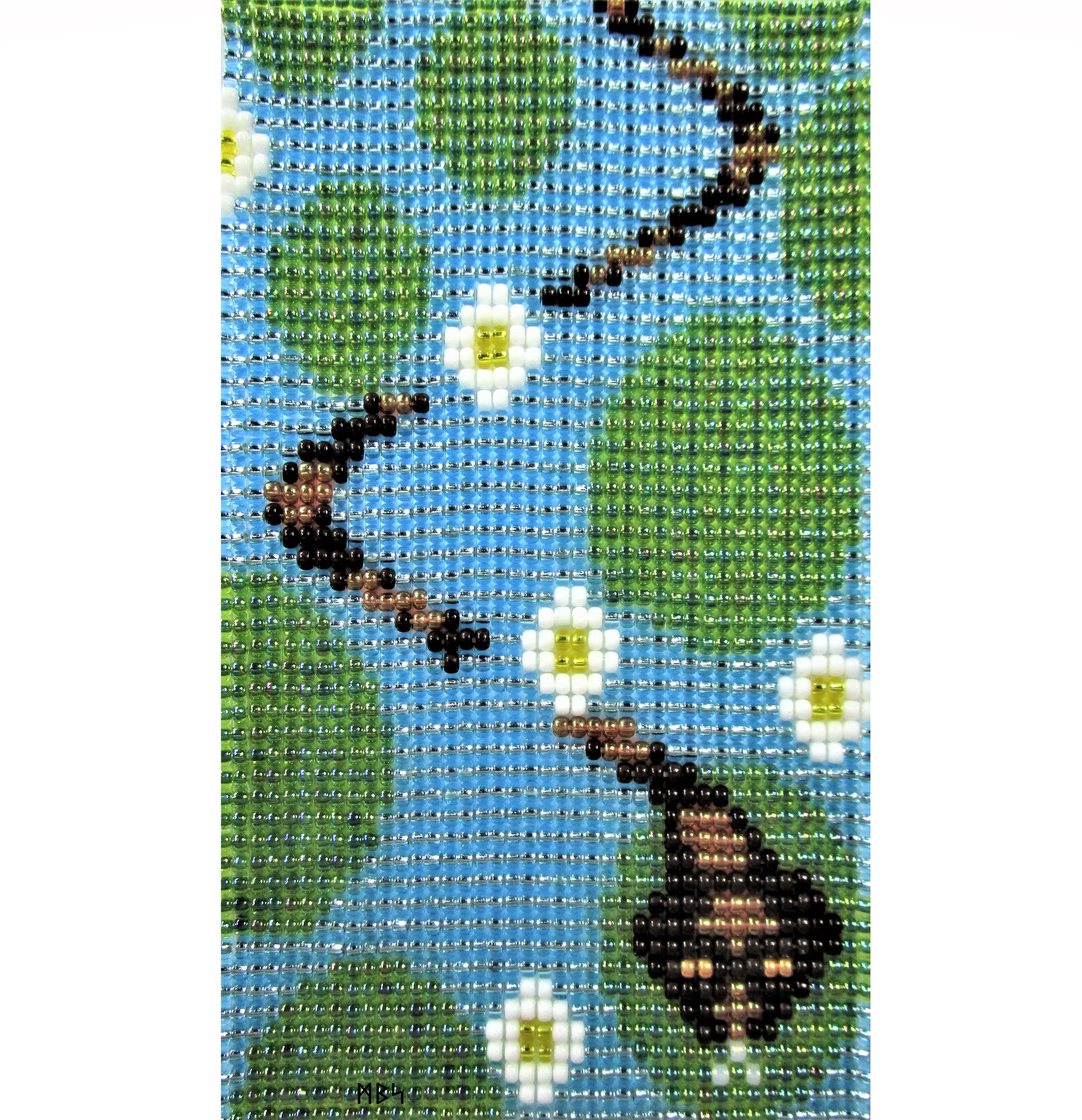 Young Water Snake Visits the Lily Pond, an on-loom bead weaving by Mike Smetzer.